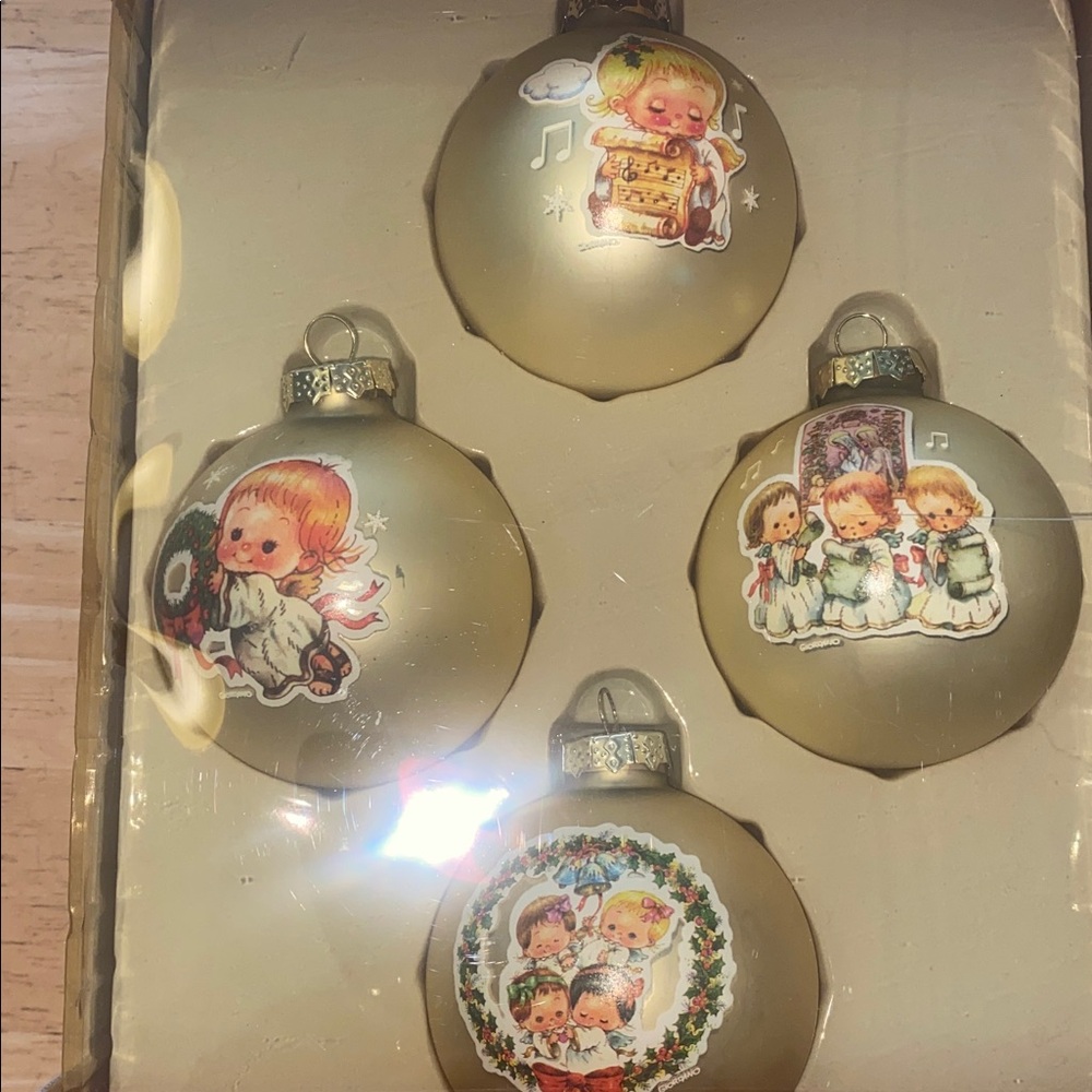 Holiday glass Ornament Set of 4  with Cherubic Designs. Never used but old nib